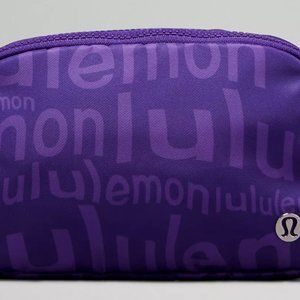 Lululemon Everywhere Belt Bag 1L Wobbley Wordmark ATOMIC PURPLE PETROL
